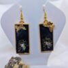 handmade resin earrings with a floral rectangular design