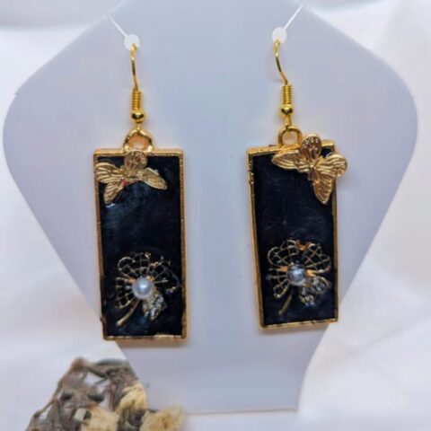 handmade resin earrings with a floral rectangular design