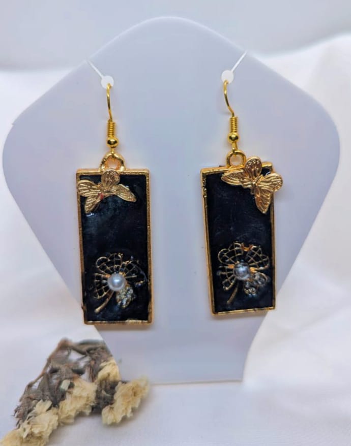 handmade resin earrings with a floral rectangular design