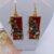 handmade resin earrings with a floral rectangular design